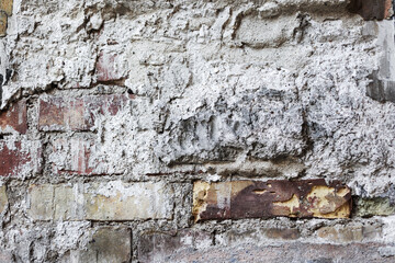 Abstract background old white brick wall with cracks and scratches. Landscape style. Great background or texture.