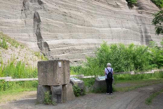 Germany, Tourist admiring the layer of volcanic ashes of the erruption of Laacher Volcano 13 thousend years ago