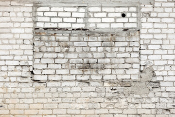 Abstract background old white brick wall with cracks and scratches. Landscape style. Great background or texture.