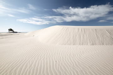 sand dunes in Sardinia with clouds