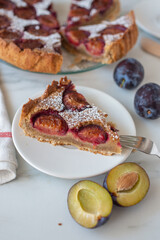 home made vanilla almond tarte with plums