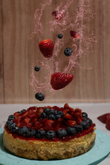 strawberry and blueberry cheese cake with spalsh fruit