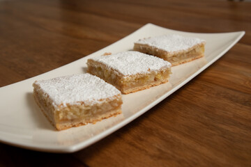 three slices of homemade lemon pie,