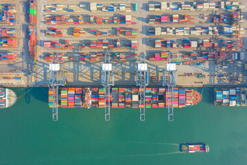 Container , container ship in export and import business and logistics. Shipping cargo to harbor by...