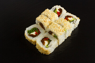 Japanese food: Set of salmon sushi and rolls with salmon and eel