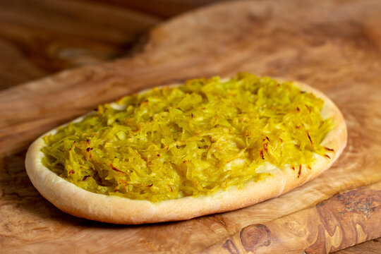 Homemade Potato Focaccia On A Wooden Cutting Board.