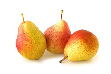 Three tasty red - yellow pears isolated on white