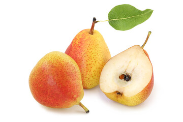 Two tasty red - yellow pears and half with leaf isolated on white