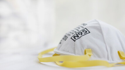 Close up of The N95 mask is placed on the doctor's desk.