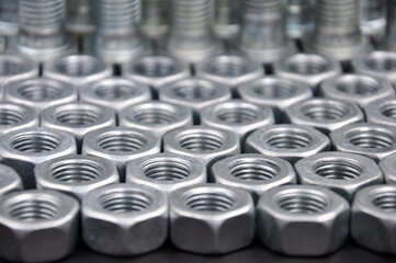 Metal bolts and nuts pattern