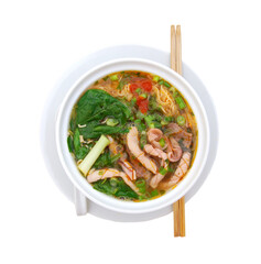 Asian noodle soup in front of white background