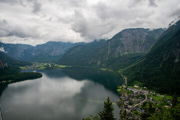 Naklejka na ściany i meble bird view of lake Hallstatt in Austria on a cloudy day. view from the top a viewing point