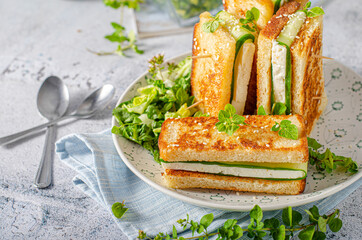 Fresh snack with cheese and cucumber