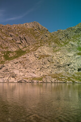 Mountain lake in the summer time hiking 