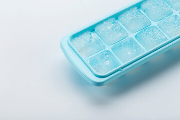 Blue ice tray with ice