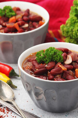 Two bowls with traditional Georgian dish - lobio