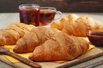 Croissants with marmalade and tea