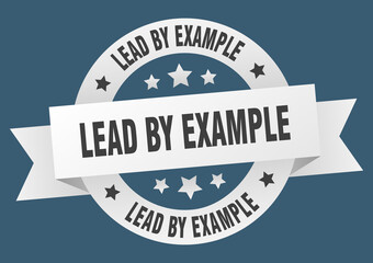 lead by example round ribbon isolated label. lead by example sign