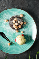 Delicious fresh fondant with hot chocolate and ice cream on table, top view