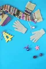 Merry Christmas, bright blue background with New Year's decor, caramel heart and space for an inscription, top view