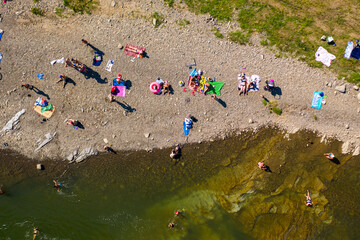 Skole Beskids National Nature Park. View from drone on people on Opir river beach, embankment