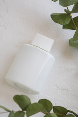 White plastic cosmetic bottle. spa and healthcare