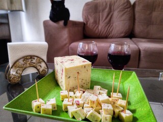 wine and cheese on a table