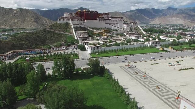 CINEMATIC AERIAL CRANE SHOT & FLY OVER OF POTALA PALACE IN LHASA TIBET CHINA