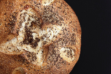 Artisan Loaf of Bread on Black Background
