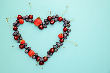 Different berries photography , heart shape