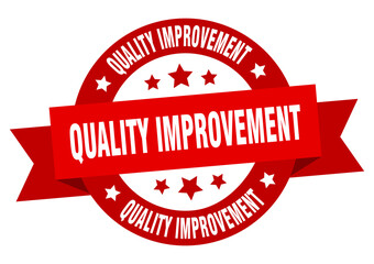 quality improvement round ribbon isolated label. quality improvement sign