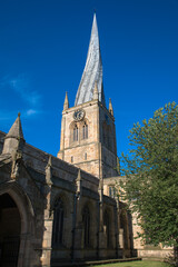 Fototapeta na wymiar The twisted spire of the Church of St Mary and All Saints, Chesterfield, Derbyshire, UK