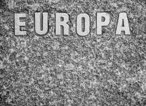 old silver word -  europa - signboard on stone background. empty copy space for inscription.