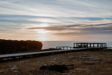 Fototapeta premium Walkway to a cliff on the Porgutal coast.