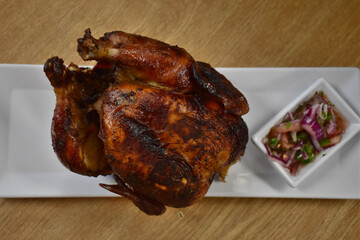 Rotisserie Chicken on a Plate With Potatoes and a Salad