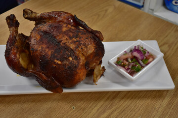 Rotisserie Chicken on a Plate With Potatoes and a Salad