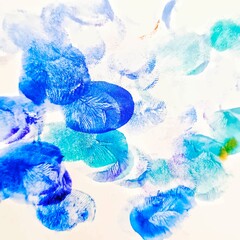 Blue and green imprints of fingers for abstract background. Watercolor stains for poster and card decoration.