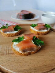 sandwiches with salted red fish and soft cheese
