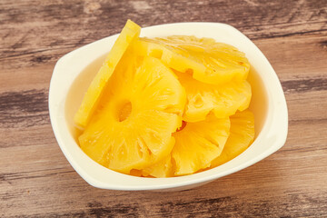 Marinated pineapple rings in the bowl
