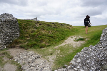 woman standing on the rocks