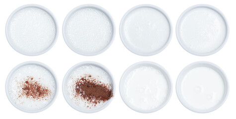 Foamed milk or cocoa in a set of cups top view. Sprinkle with chocolate