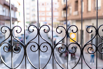 Black cast iron railing with beautiful shapes.