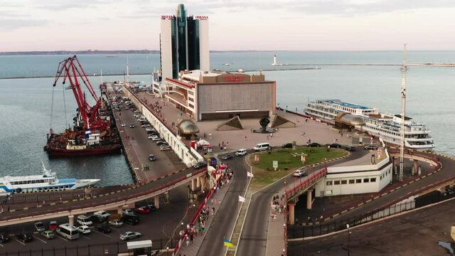 Aerial view. The seaport of the city of Odessa in Ukraine. Buildings at sunset on a summer evening. Travel and tourism
