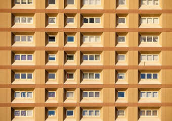 Fototapeta na wymiar Tall high rise council flats against blue sky