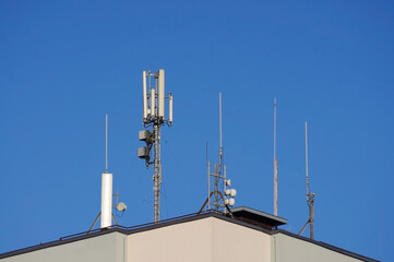 Telecommunications antennas on the roof of building