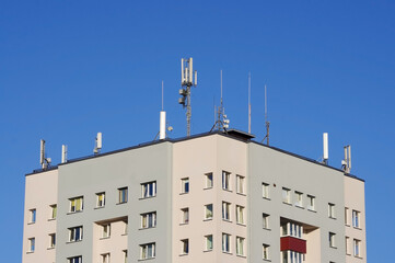 Telecommunications antennas on the roof of building