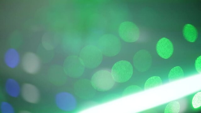 multi-colored lights during a party in blur, color music, defocus