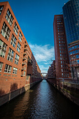Historical warehouses on the Zollkanal canal in Speicherstadt district in Hamburg, Germany