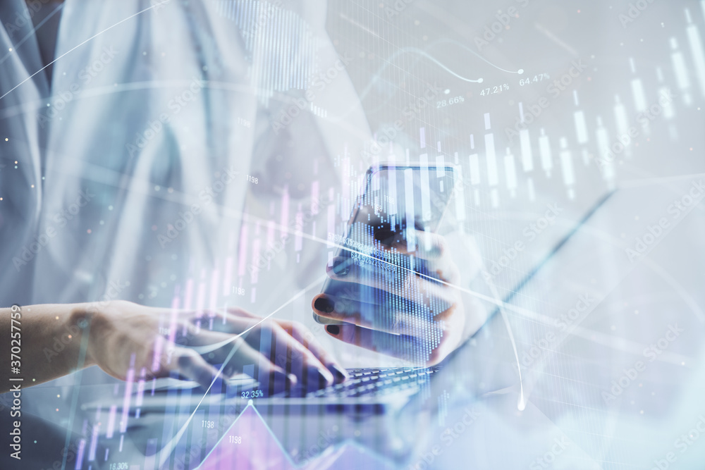 Poster double exposure of financial graph sketch hologram and woman holding and using a mobile device. stoc