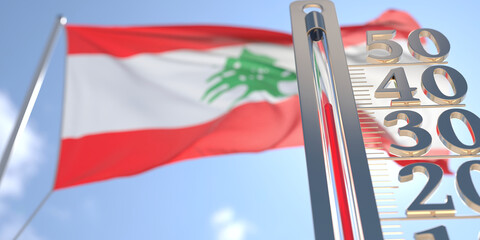 Thermometer shows high air temperature against blurred flag of Lebanon. Hot weather forecast related 3D rendering